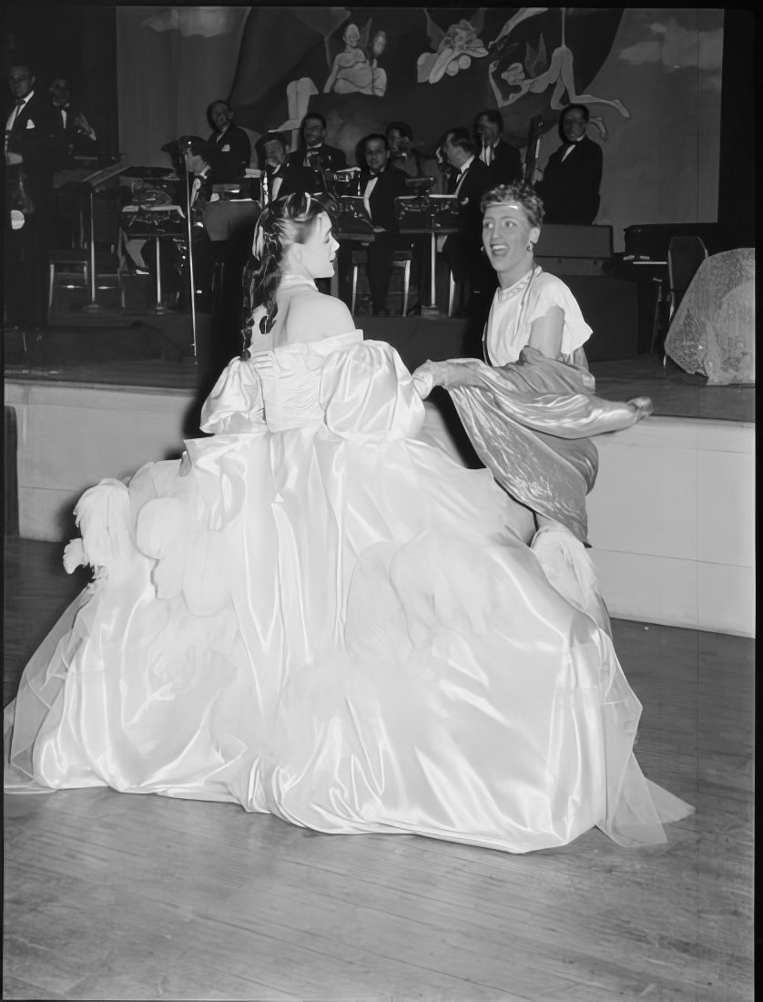 A costumed couple dancing, 1951.