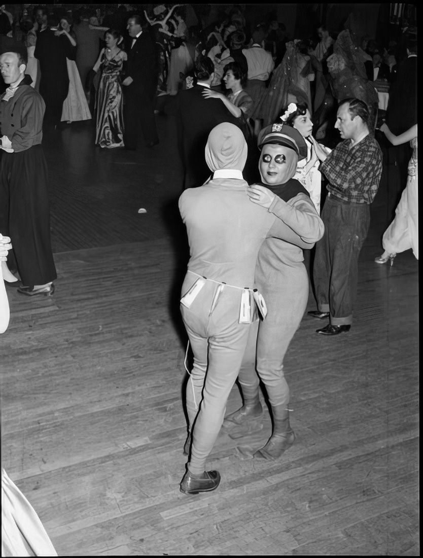 A costumed couple dancing, 1951.