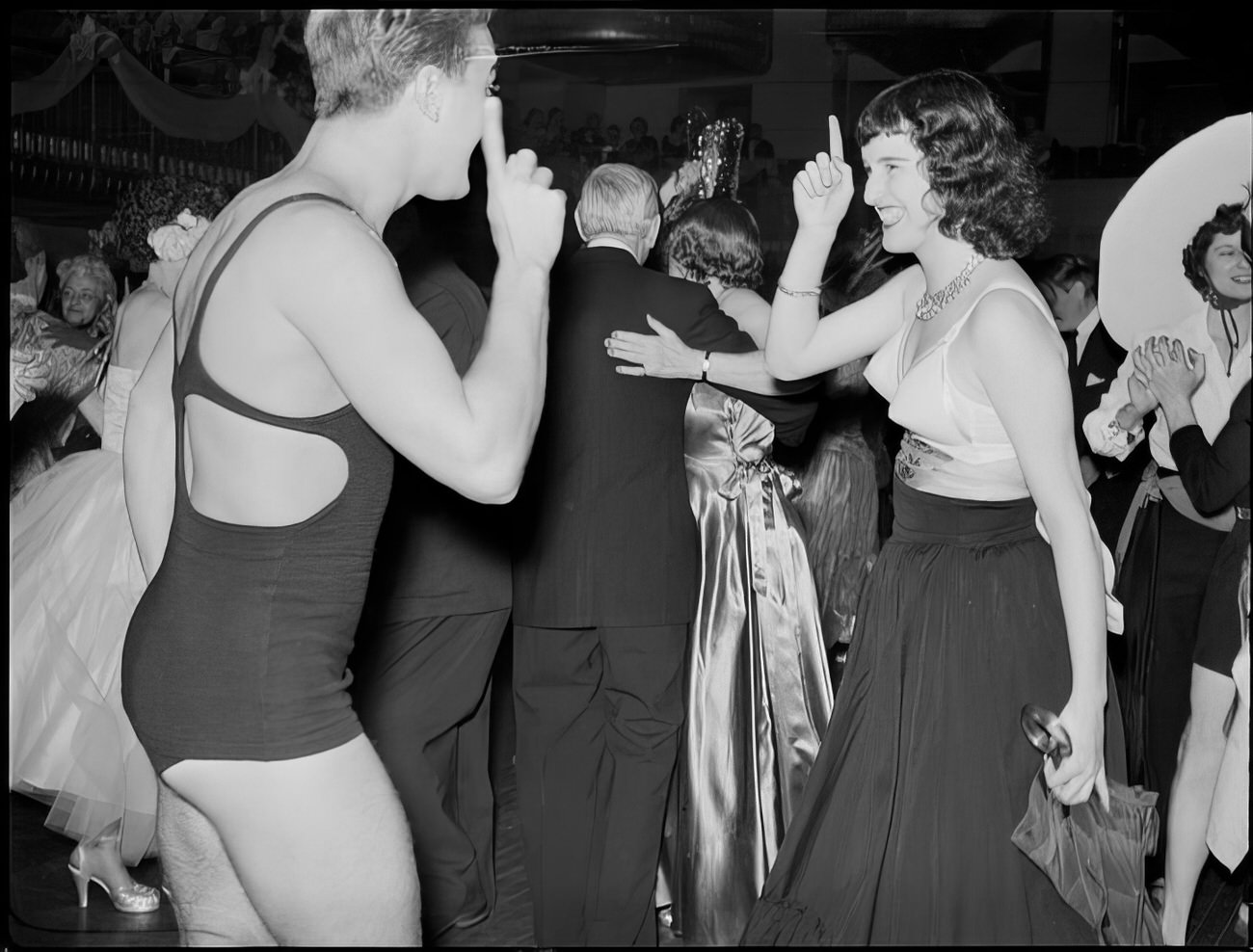 A costumed couple dancing, 1951.