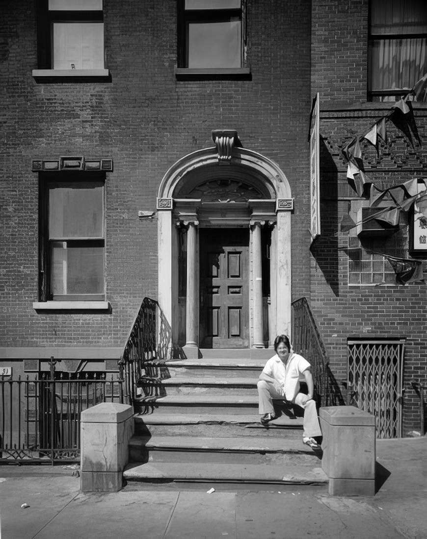 A man sitting on the stoop of 51 Market Street, 1978.