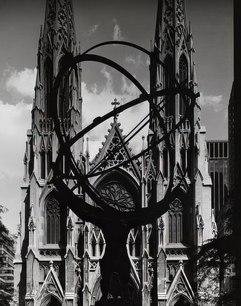 A view through "Atlas" in Rockefeller Center to St. Patrick's Cathedral, 1973.