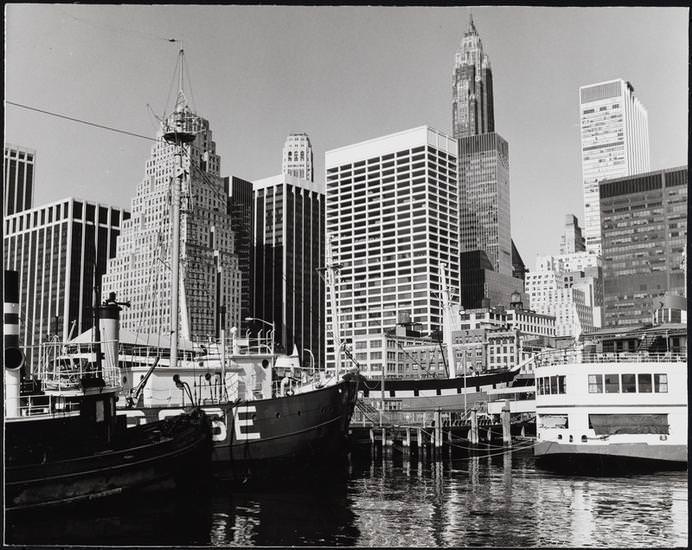 Looking southwest toward Piers 15-17 at the South Street Seaport and the skyscrapers of Lower Manhattan, 1973.