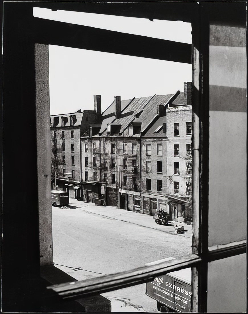 Looking southeast through a window toward Schermerhorn Row, 1973.