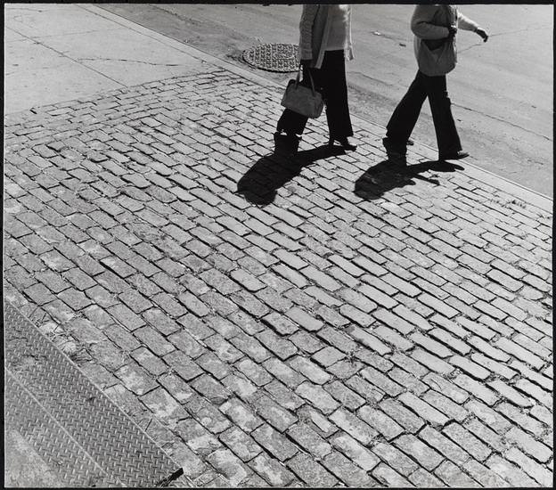 Cobblestone paving and metal steps in front of 165 John Street, 1973.