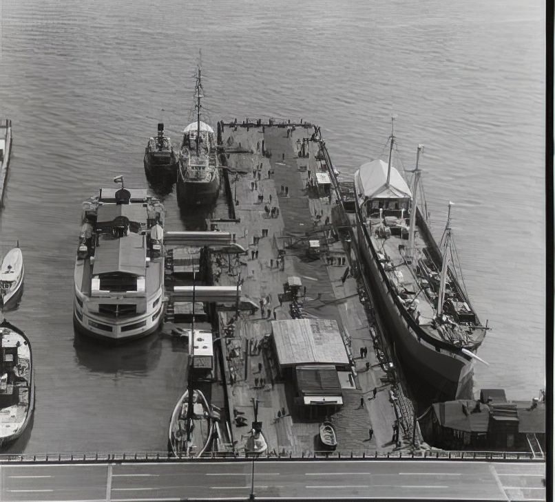 "Robert Fulton" and "Wavertree" at the dock south of Schermerhorn Row, 1974.