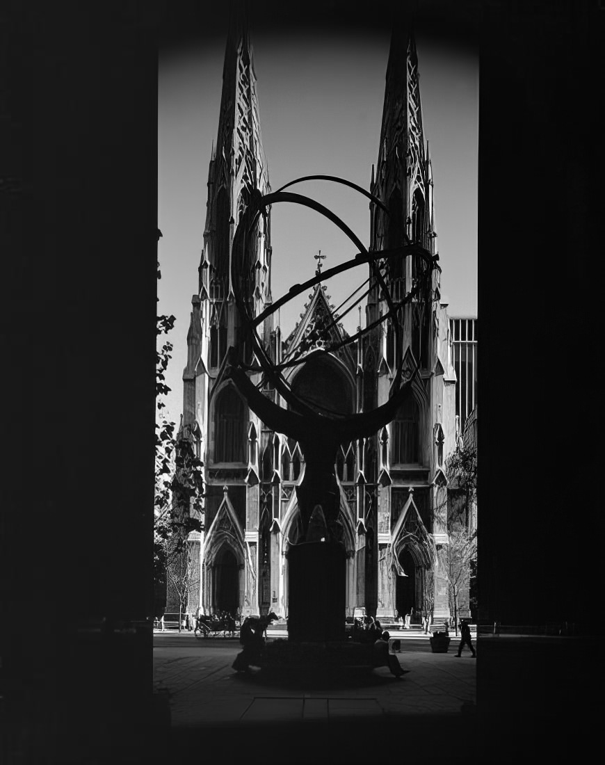 A view through "Atlas" in Rockefeller Center to St. Patrick's Cathedral, 1973.