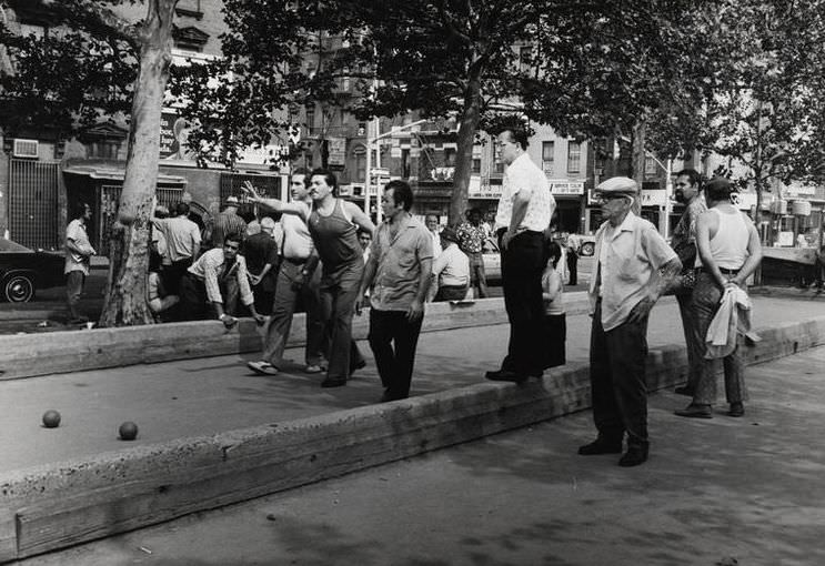 Men playing bocce in Peretz Square, 1975