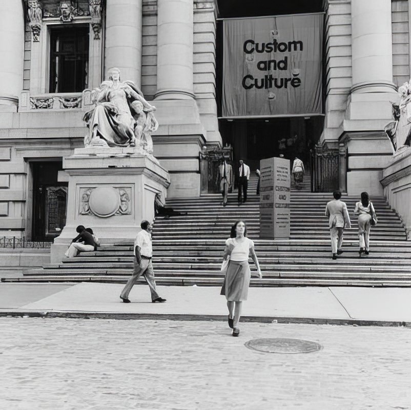 "America" statue and Custom and Culture sign in front of Alexander Hamilton U.S. Custom House, 1977