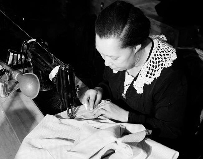 Sewing on 10th Avenue and 36th Street, 1937.