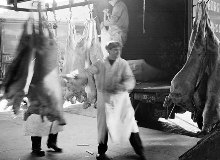 West Washington Market -- Weighing and Loading Beef, 1938.