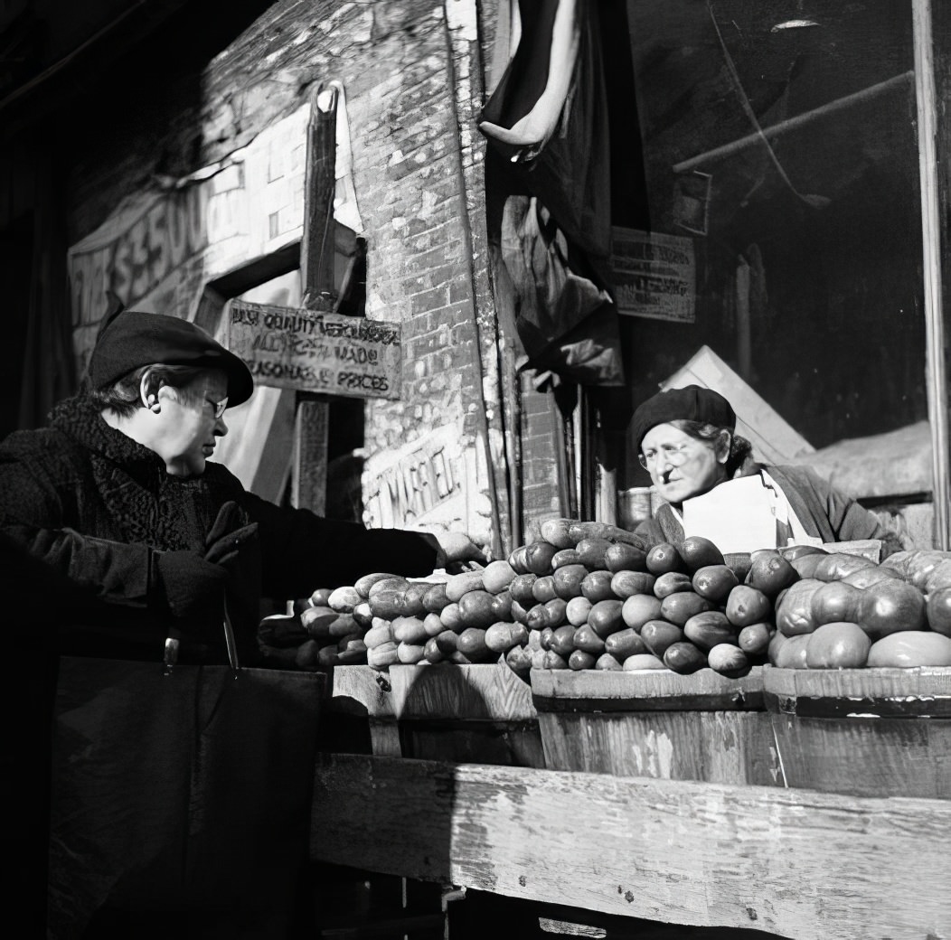 Buying produce on First Ave & 8th St, 1935.