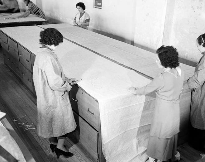 Cutting fabric, 1937.