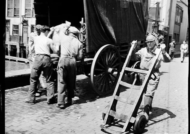 Loading barrels, 1938