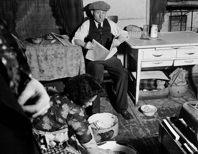 Man and woman in kitchen, 1936