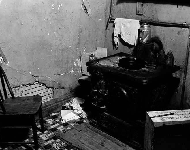 Kitchen stove with old-fashioned flat irons, 1936