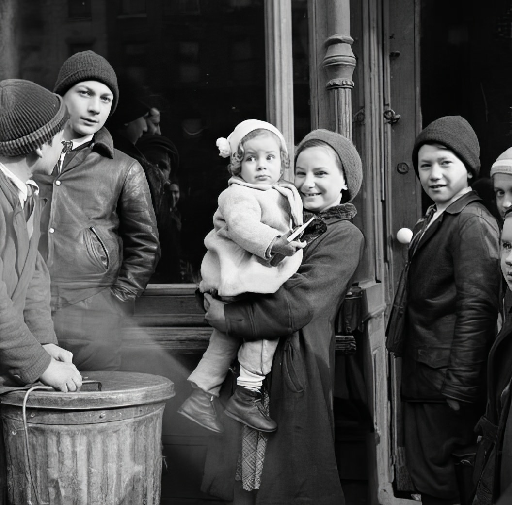 Group of children near garbage can, 1936