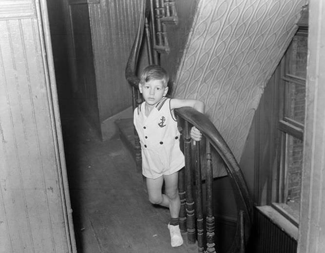 Little boy on staircase, 1935