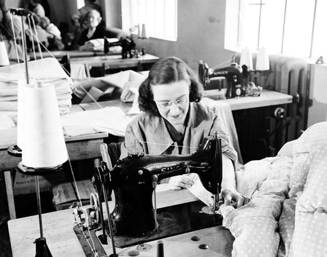 Sewing a quilt, 10th Ave & 36th St, 1937