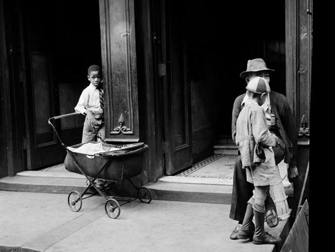 Young boys with a baby carriage, 1939.