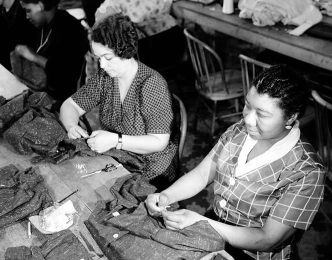 Sewing buttons, 10th Ave. & 36th St., 1938.