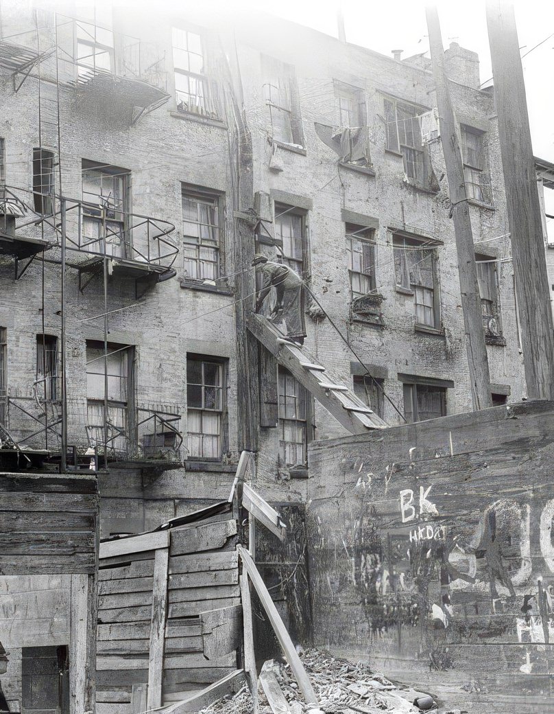 Man on a wooden ladder, 1936.