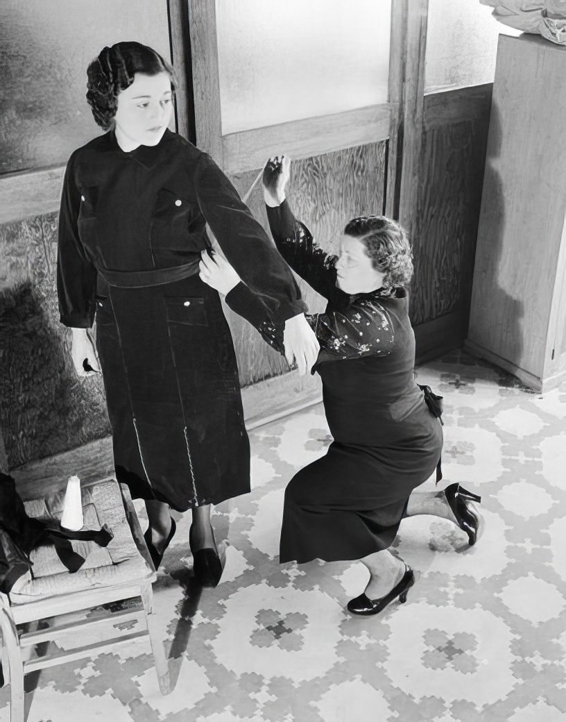 Dress fitting, 1937.