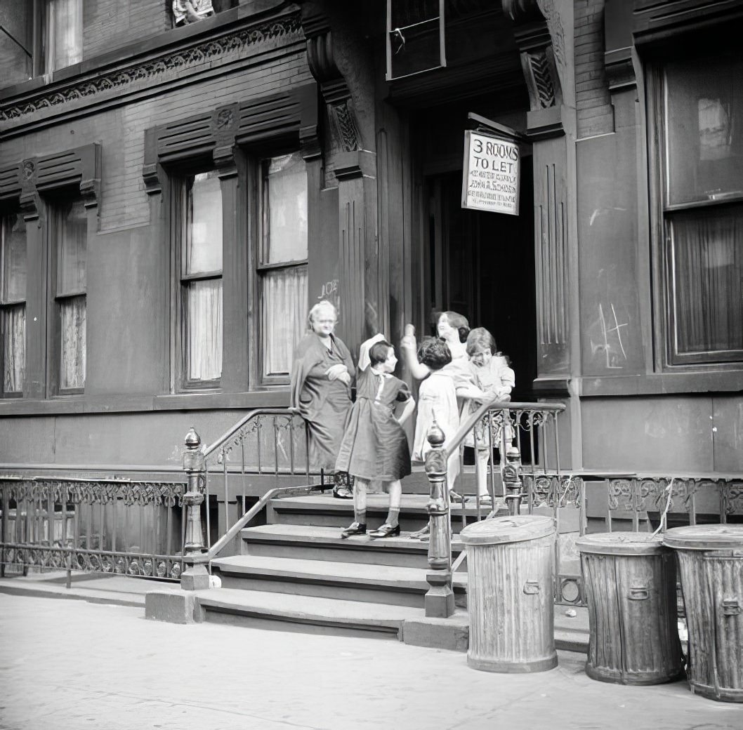 People on stoop, 1935.