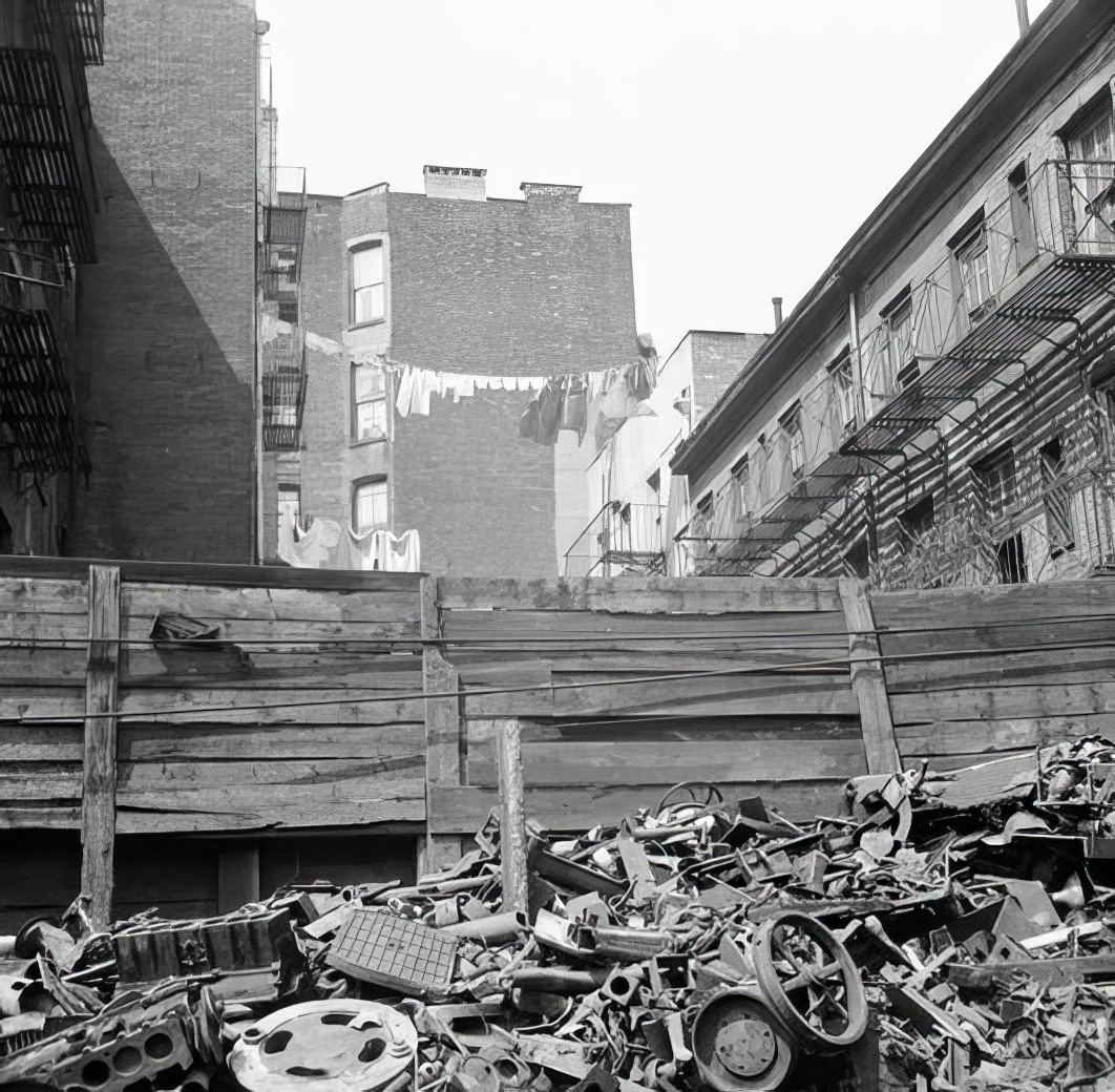 Junk in a vacant lot, 1936.