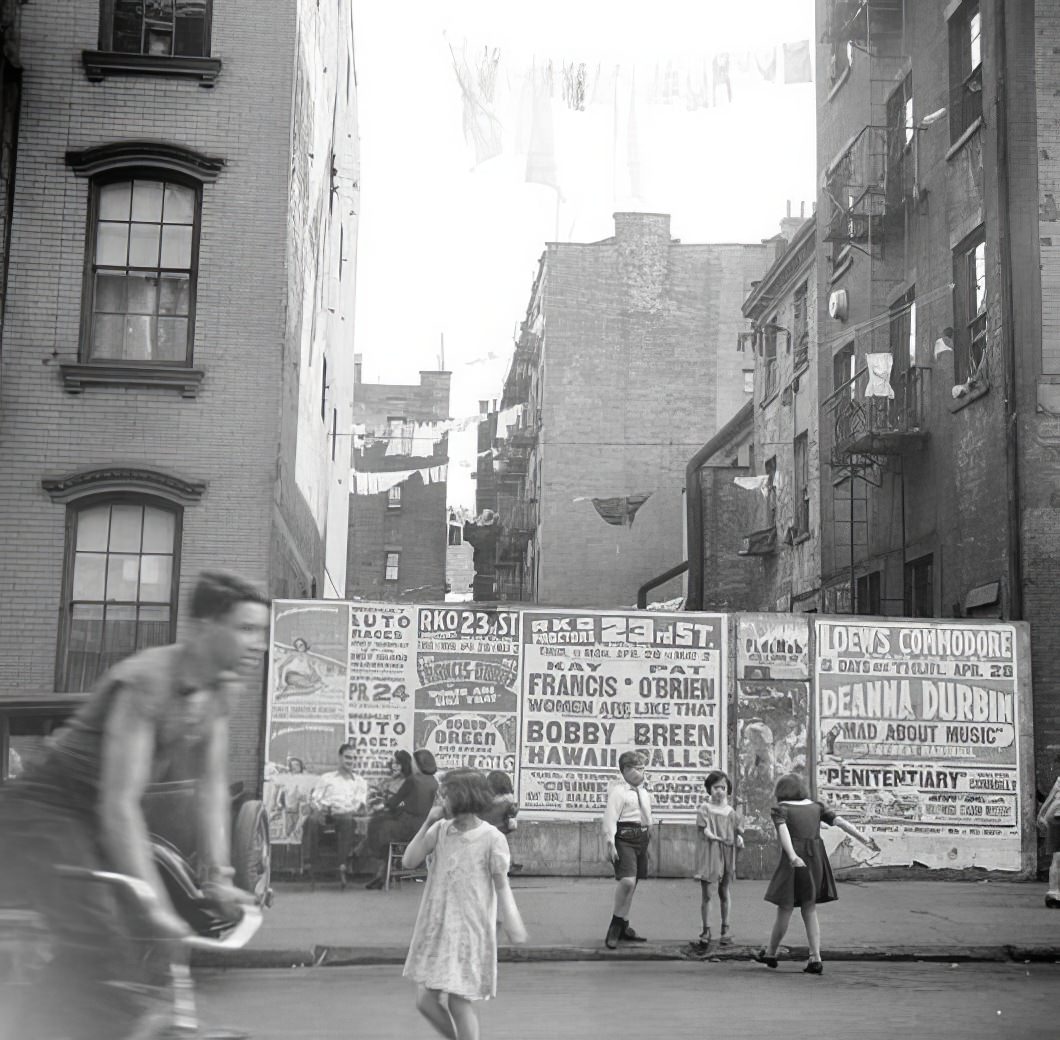 Playing in street, 1936.