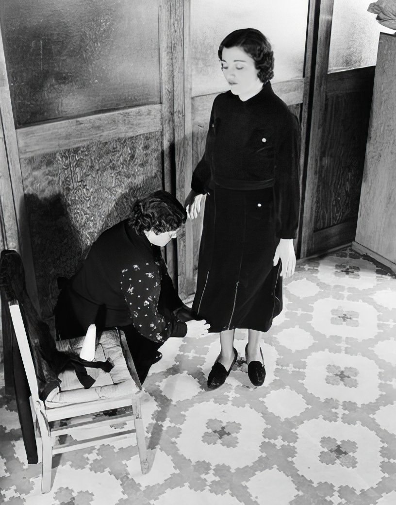 Dress fitting, 1937.