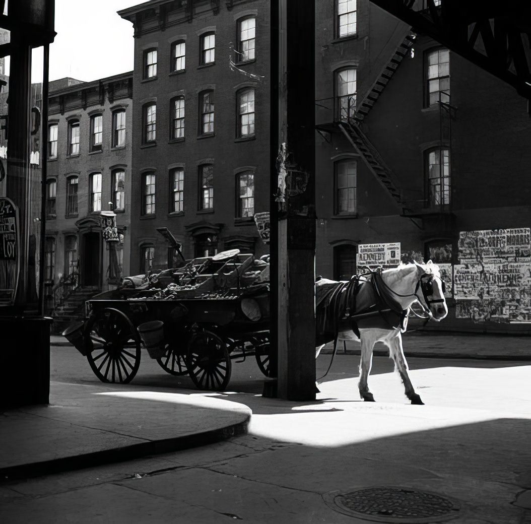 Horse and wagon on a corner, 1937.