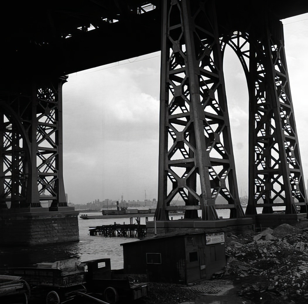 Waterfront scene: under a bridge, May 1937.