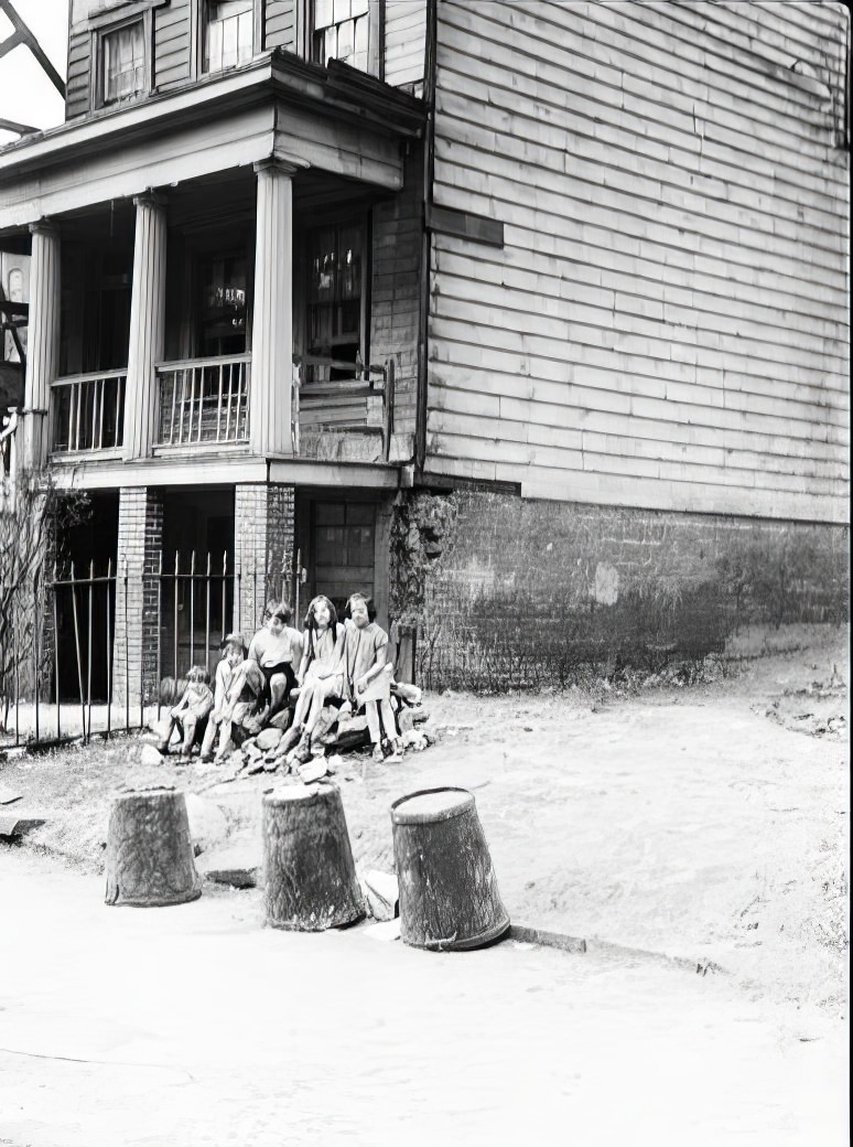 Children and garbage cans, 1935.