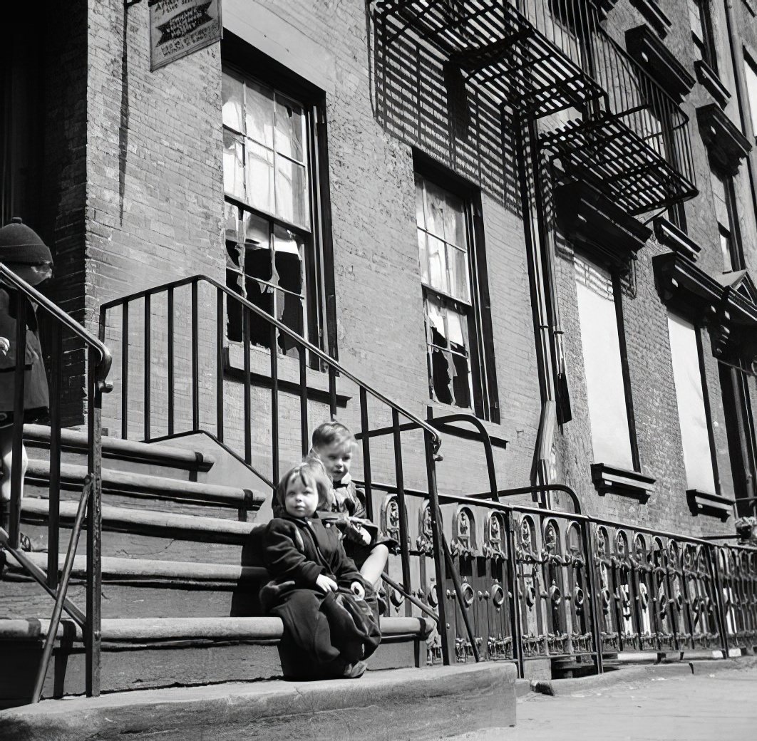 Two children on a stoop, 1935.