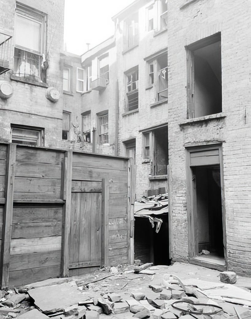 Tenement rear and junk, 1935.