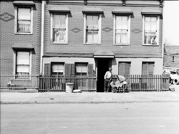 On the sidewalk, 1935.