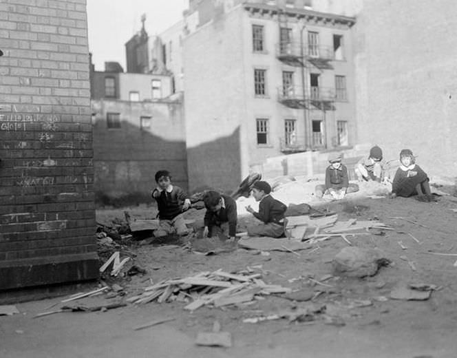 Children playing in courtyard, 1935.