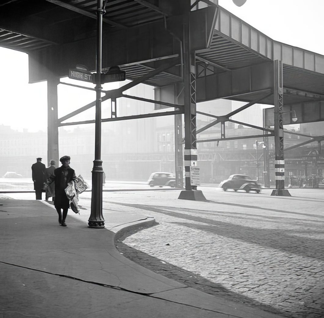 Waterfront scene: under the El, May 1937.