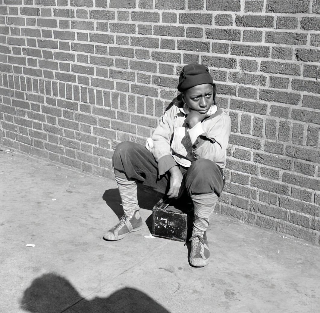 Waterfront scene: shoeshine, May 1937.