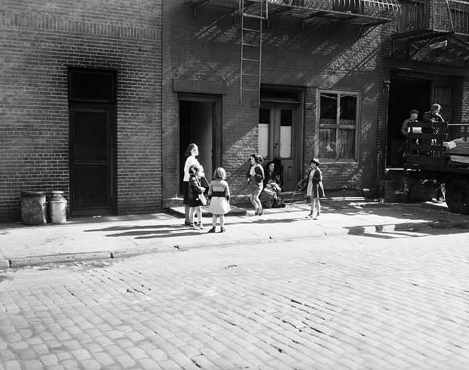 Little girls jumping rope, 1936.