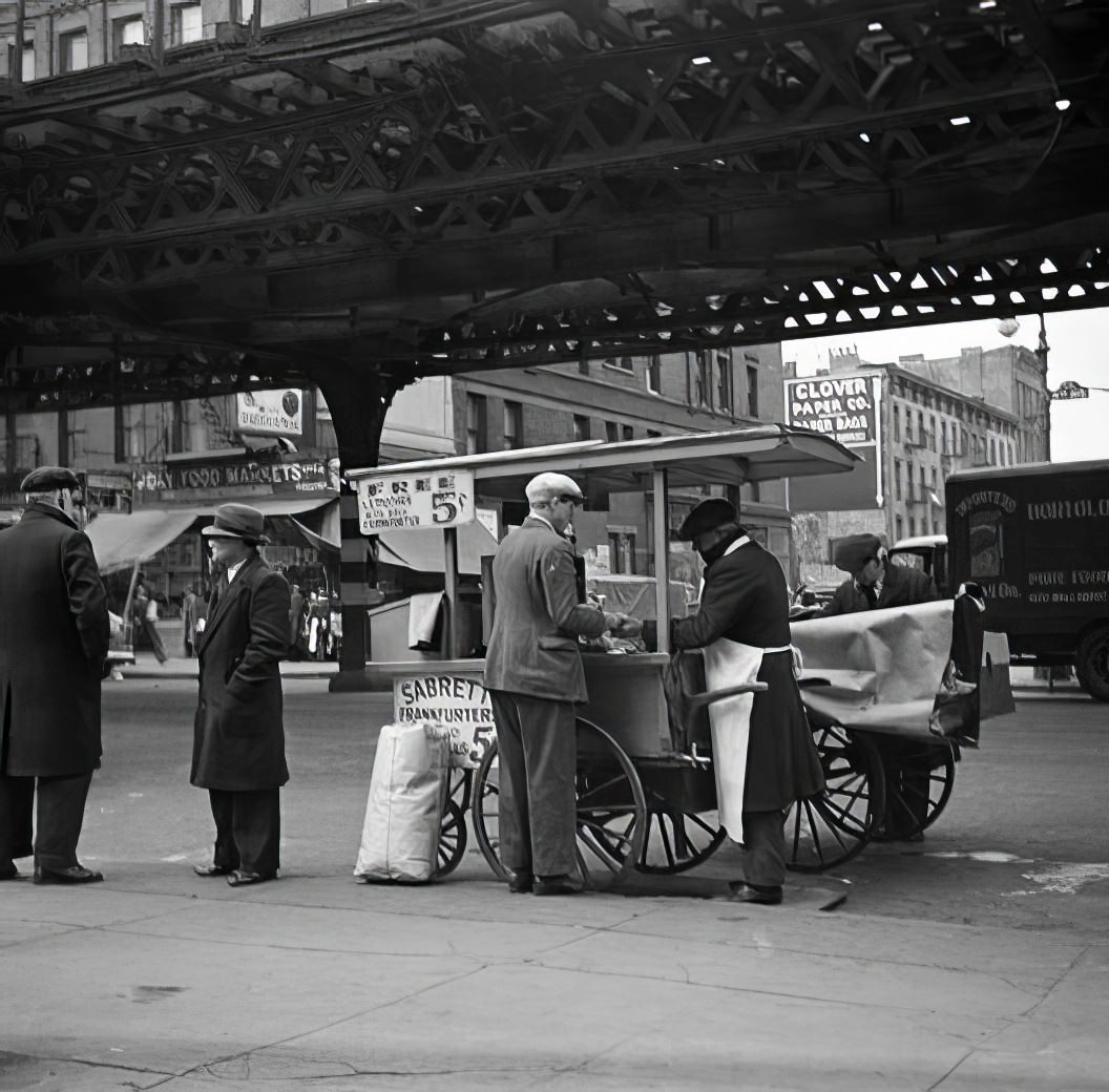 Hot dogs under the elevated train, circa 1936.