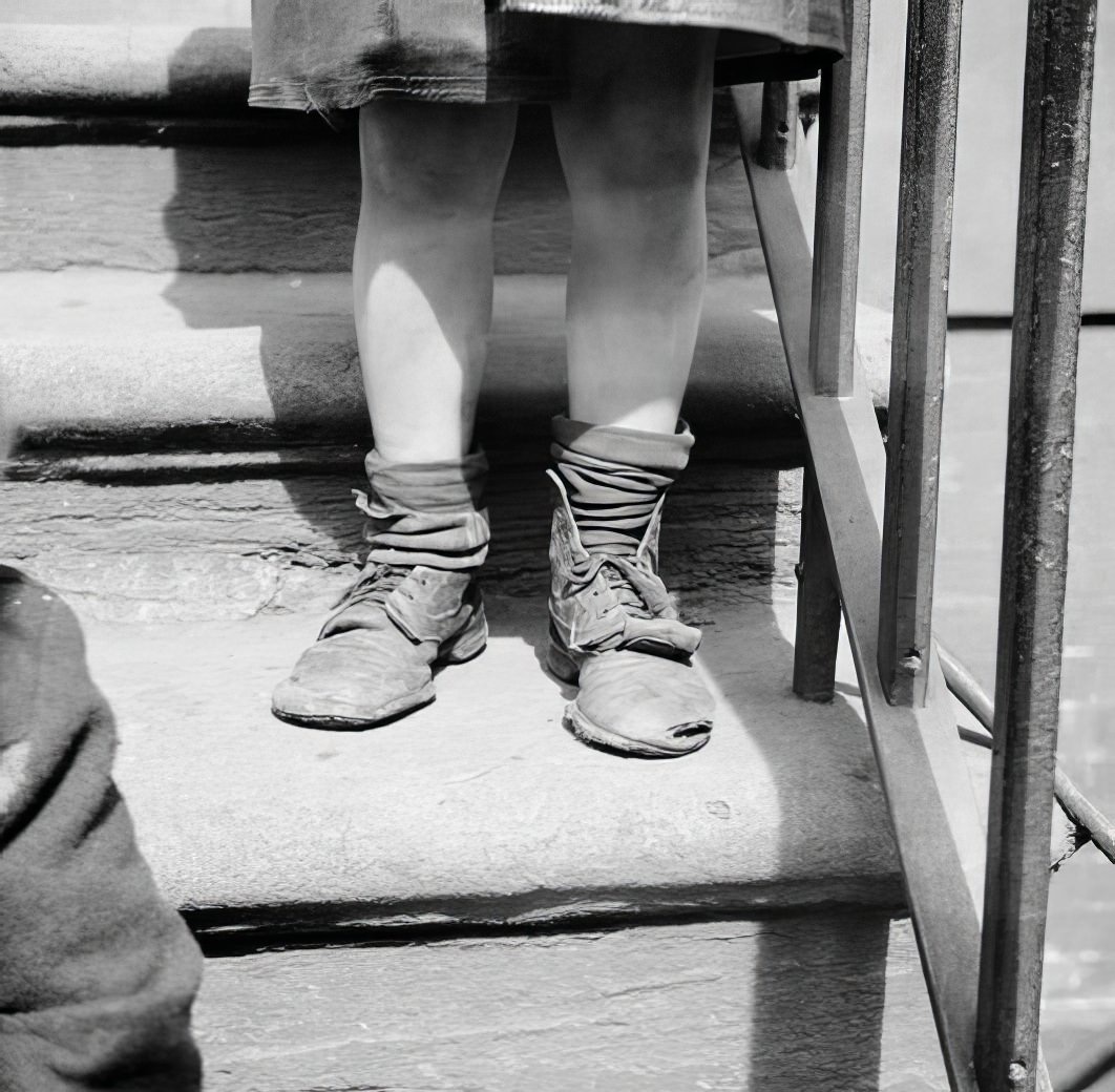 Worn-out shoes, 1936.