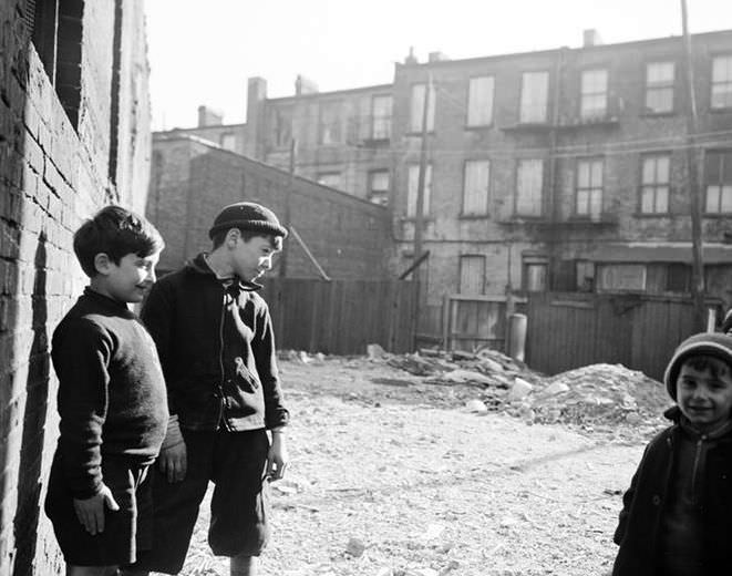 Close up of children in a vacant lot, 1935.