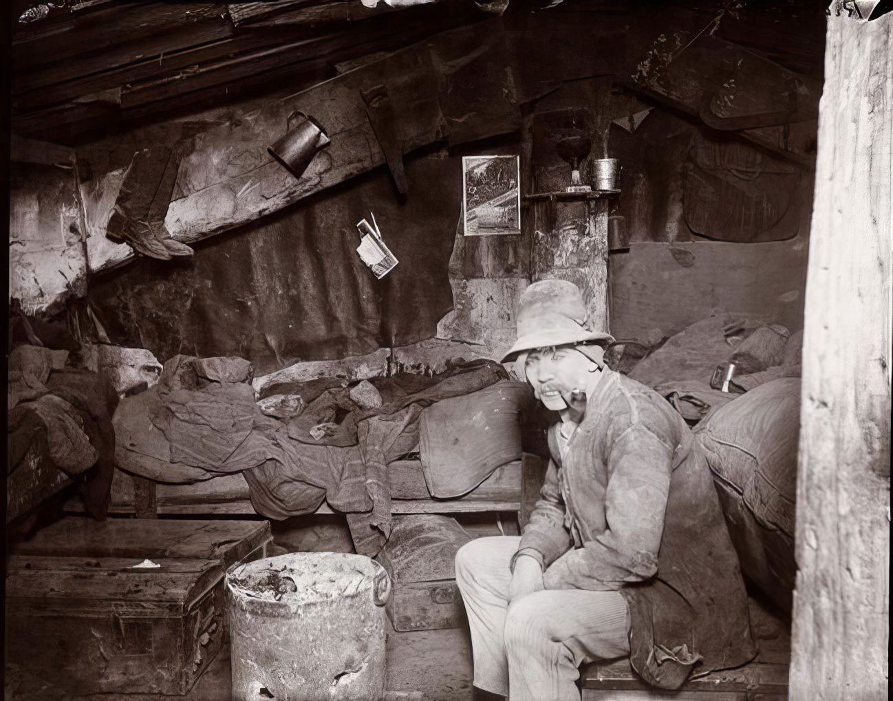 An Italian home under a dump, 1894.