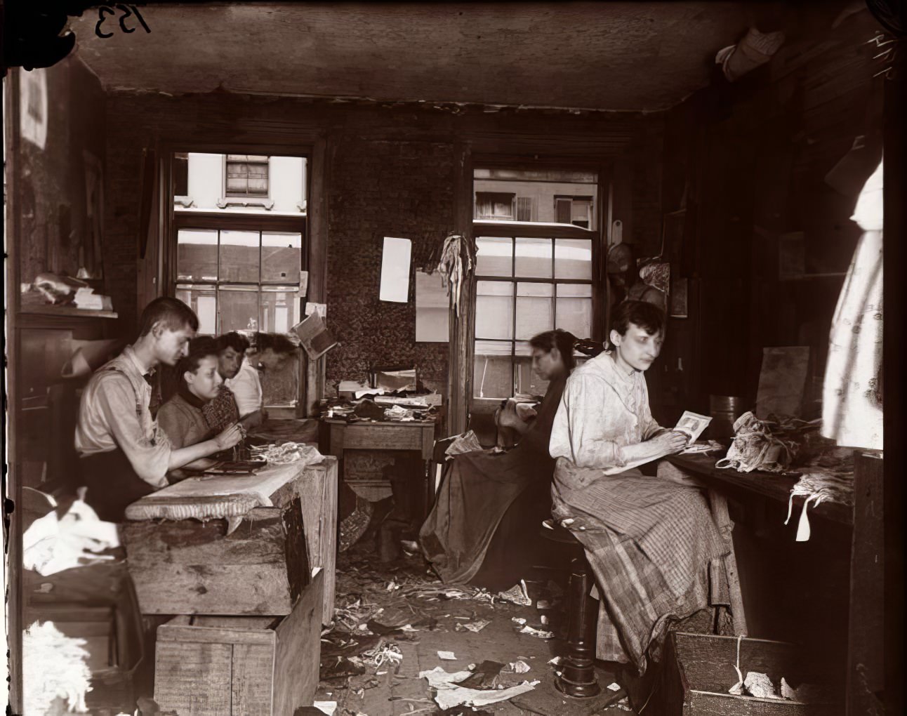 Necktie workshop in a Division Street tenement, 1891.