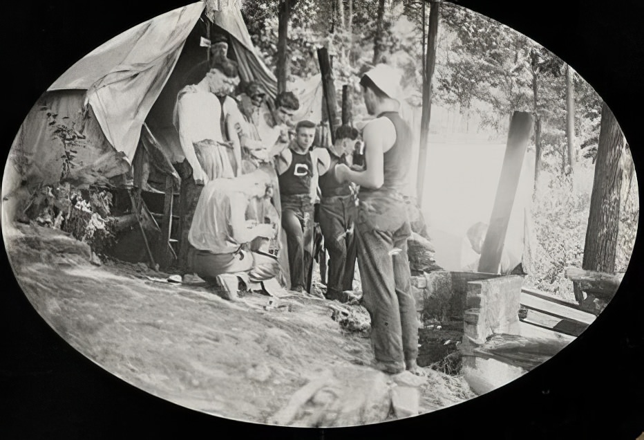 Young men around a tent, 1914.