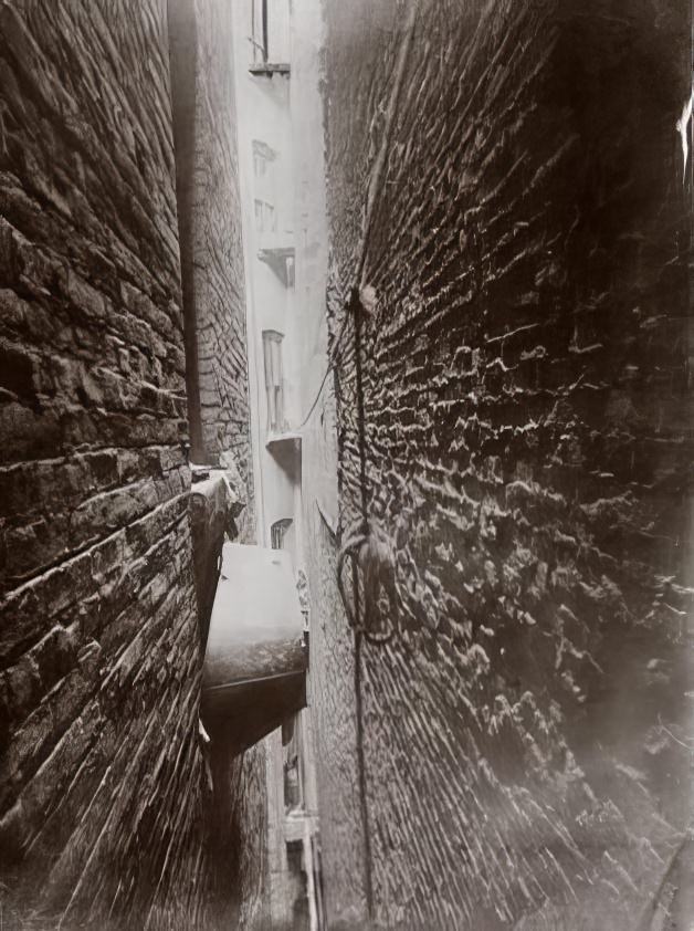 A bathtub hanging in a shaft, 1894.