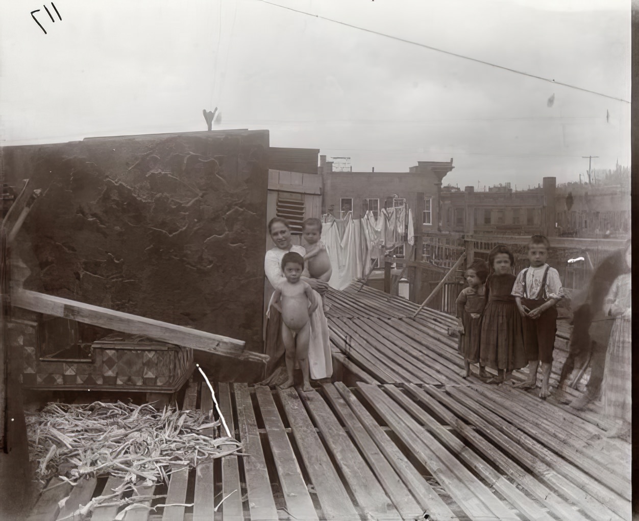 Children on the roof of the Barracks (No. 116), 1891.