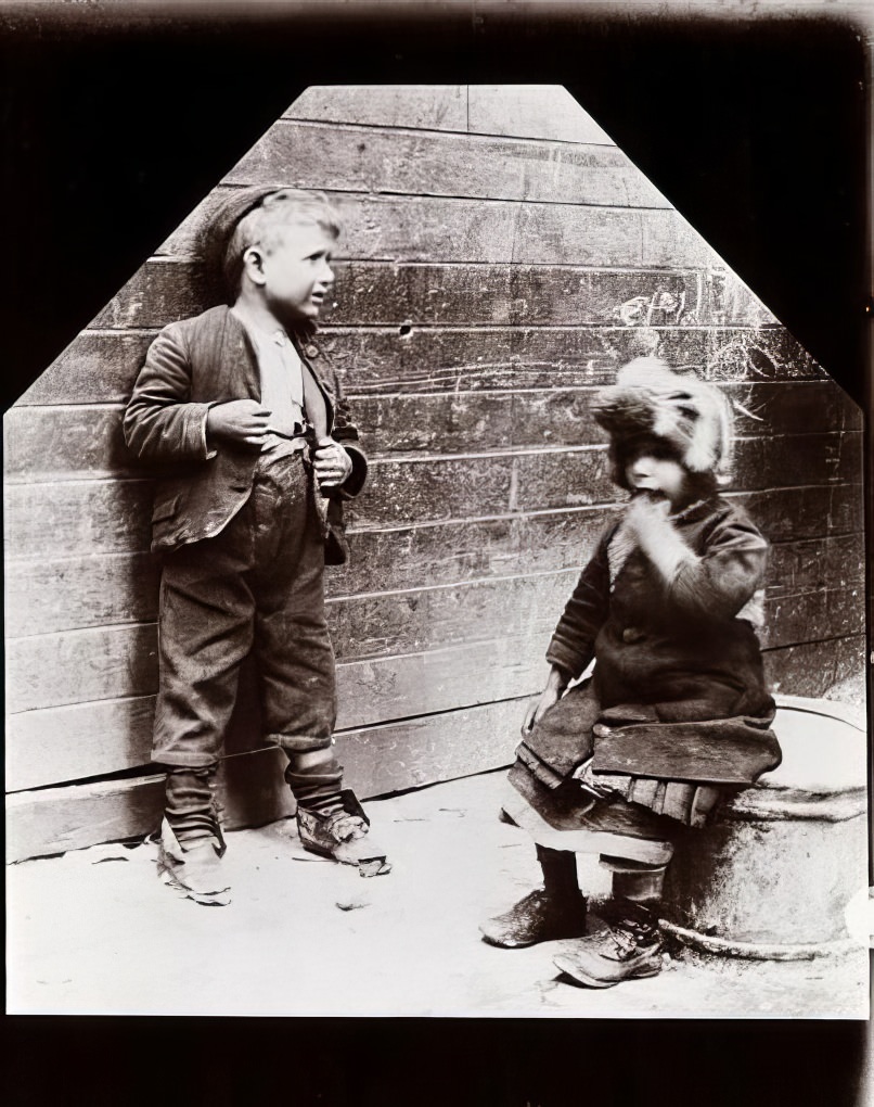 Greecho and his playmate talking, 1891.