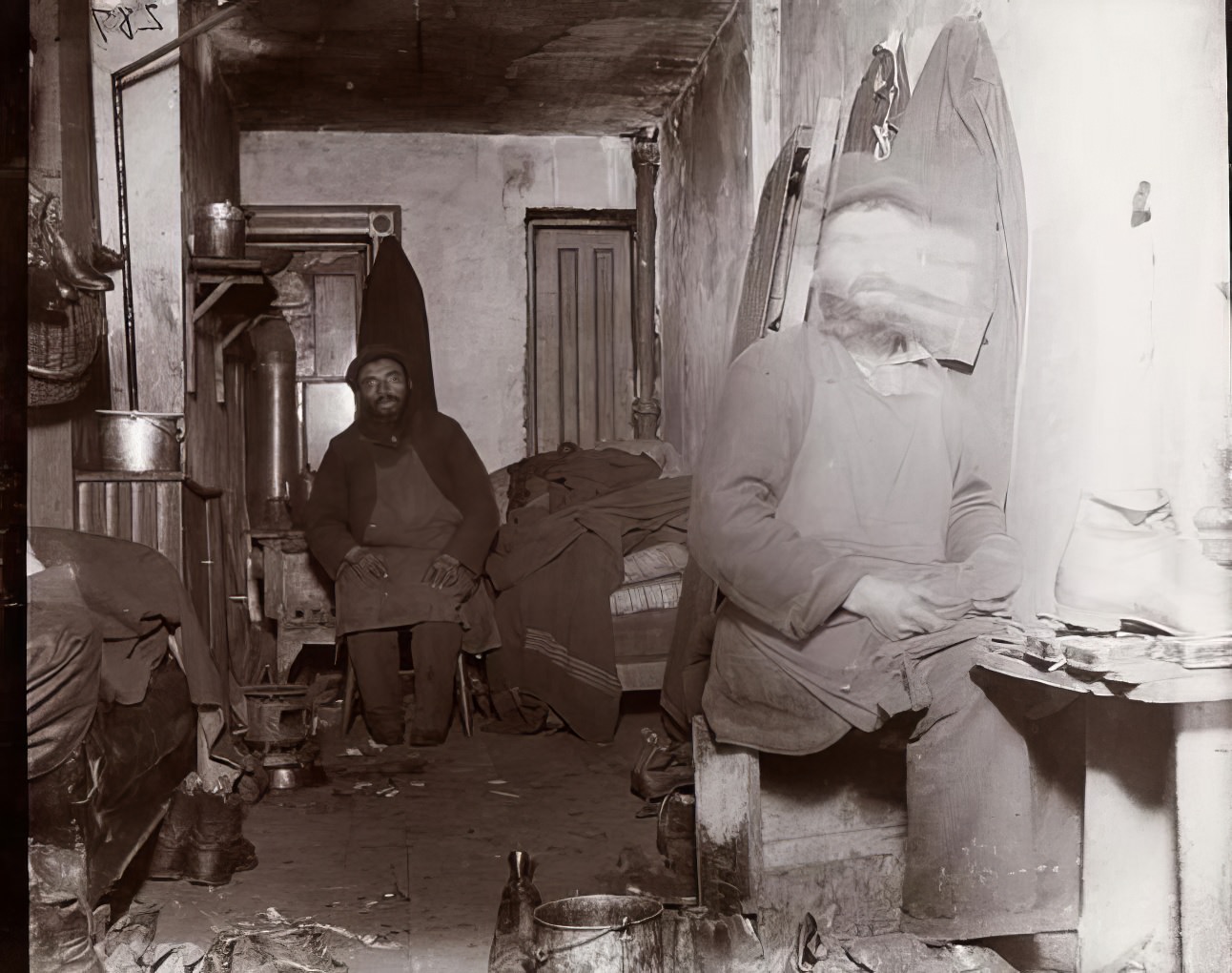 Shoemakers in their Ludlow Street cellar, 1895.